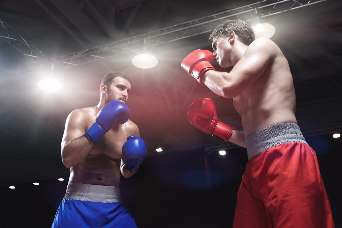 two boxers are fighting - pro-boxing event